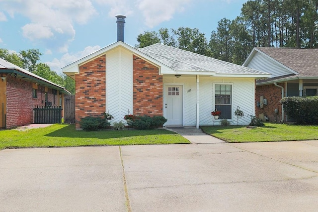 1113 Rose Meadow Loop, Slidell, LA 70460 - view of front of home with brick siding and roof with shingles