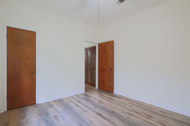 1113 Rose Meadow Loop, Slidell, LA 70460 - empty room featuring wood finished floors and baseboards