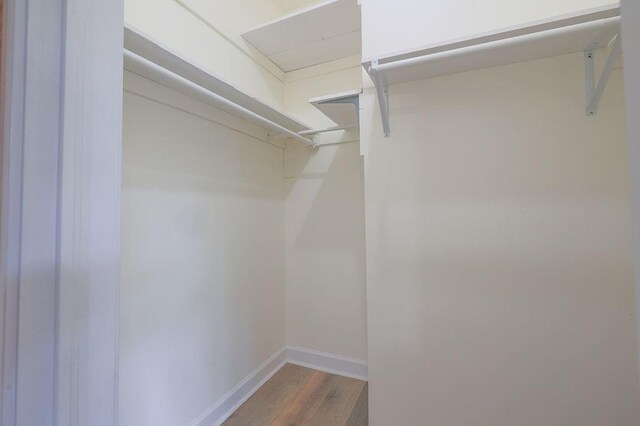 1113 Rose Meadow Loop, Slidell, LA 70460 - spacious closet featuring wood finished floors
