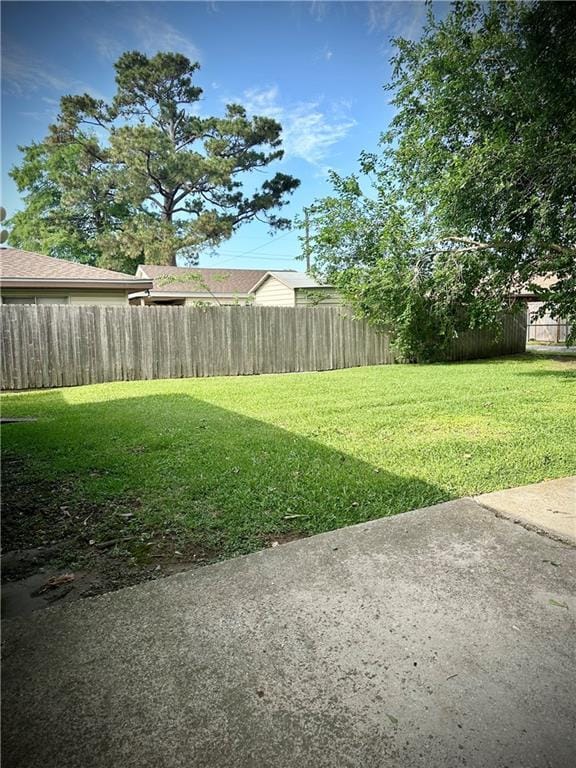 2228 Kentucky Ave, Kenner, LA 70062 - view of yard featuring a patio area