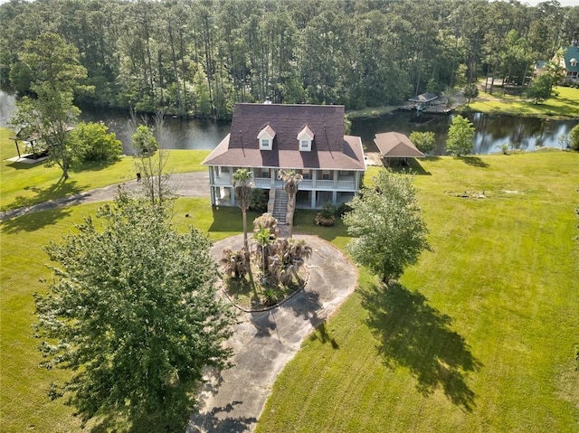 59394 E Harbor Ln, Lacombe, LA 70445 - view of subject property featuring a nearby body of water and a heavily wooded area
