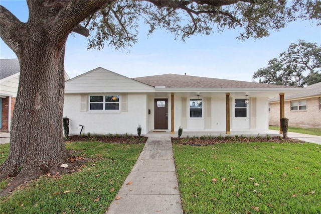 3313 Clifford Dr, Metairie, LA 70002 - view of front facade featuring covered porch, a front lawn, and brick siding