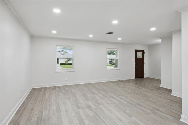 3313 Clifford Dr, Metairie, LA 70002 - spare room with plenty of natural light, recessed lighting, light wood finished floors, baseboards, and crown molding