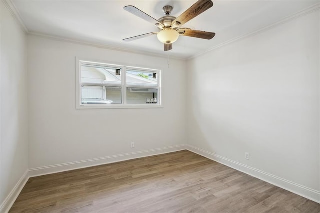 3313 Clifford Dr, Metairie, LA 70002 - spare room featuring light wood-type flooring, ornamental molding, baseboards, and a ceiling fan
