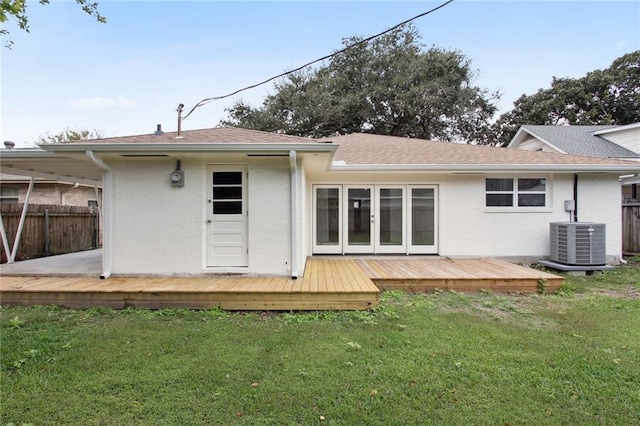 3313 Clifford Dr, Metairie, LA 70002 - rear view of property with central AC, a deck, brick siding, french doors, and roof with shingles