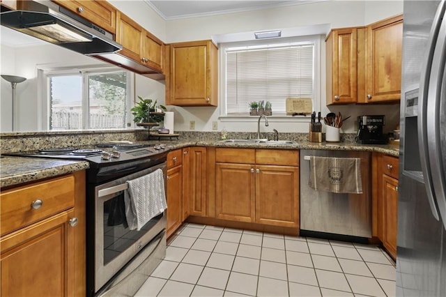 2529 Hudson Pl, New Orleans, LA 70131 - kitchen with appliances with stainless steel finishes, a sink, ornamental molding, under cabinet range hood, and brown cabinetry