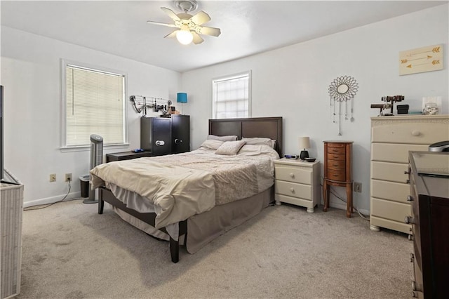 2529 Hudson Pl, New Orleans, LA 70131 - bedroom with light carpet, a ceiling fan, and baseboards