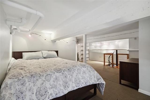 920 Poeyfarre St Unit 264, New Orleans, LA 70130 - bedroom with carpet flooring