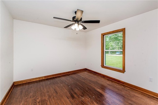 51075 Jenkins Ln, Tickfaw, LA 70466 - unfurnished room with dark wood-style flooring, baseboards, and a ceiling fan