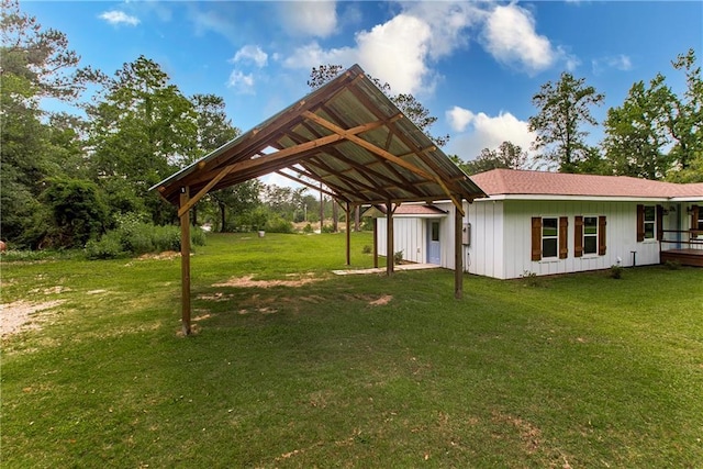 51075 Jenkins Ln, Tickfaw, LA 70466 - view of green lawn with a detached carport