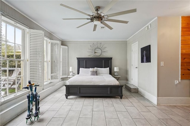 2539 N Rampart St, New Orleans, LA 70117 - bedroom featuring ornamental molding, light tile patterned flooring, and a ceiling fan