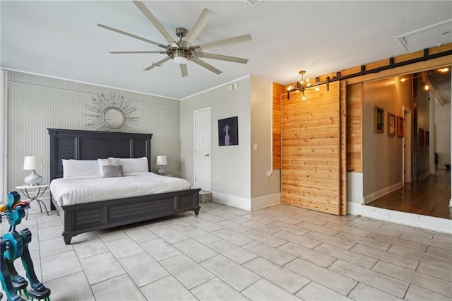 2539 N Rampart St, New Orleans, LA 70117 - bedroom featuring wood walls, a barn door, and light tile patterned floors