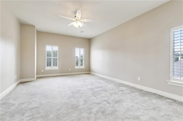 6919 Memphis St, New Orleans, LA 70124 - carpeted empty room featuring ceiling fan, healthy amount of natural light, and baseboards