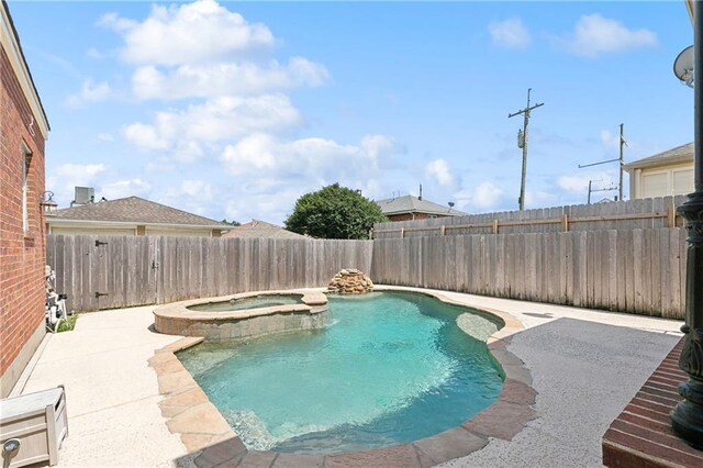 6919 Memphis St, New Orleans, LA 70124 - view of swimming pool with a fenced backyard, a patio, and a pool with connected hot tub