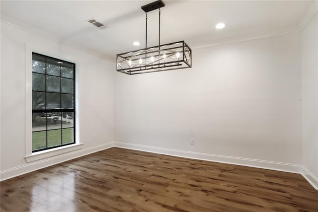 25 Woodvine Ct, Covington, LA 70433 - unfurnished dining area with ornamental molding, dark wood-style flooring, baseboards, a chandelier, and recessed lighting
