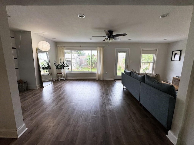 3609 Green Acres Rd, Metairie, LA 70003 - living area featuring dark wood finished floors, ceiling fan, baseboards, and recessed lighting