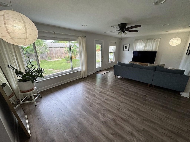 3609 Green Acres Rd, Metairie, LA 70003 - living area with dark wood-style flooring, baseboards, a ceiling fan, and recessed lighting