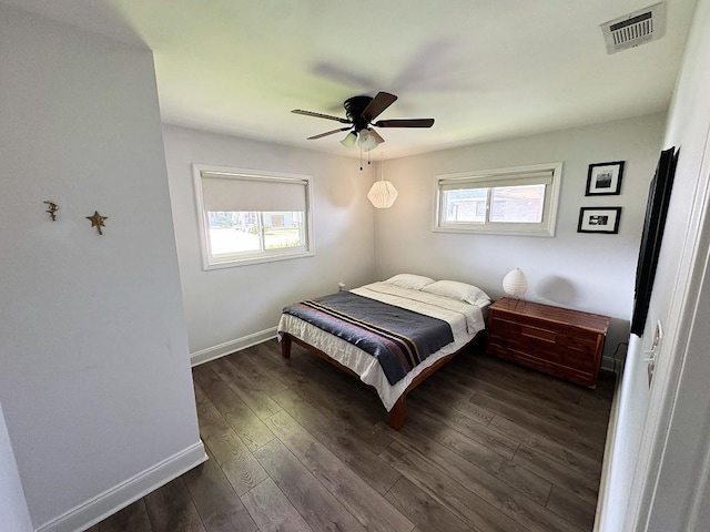 3609 Green Acres Rd, Metairie, LA 70003 - bedroom featuring baseboards, dark wood-style floors, and a ceiling fan