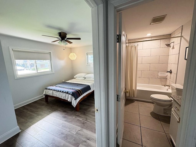 3609 Green Acres Rd, Metairie, LA 70003 - bedroom featuring baseboards, a ceiling fan, and wood finished floors
