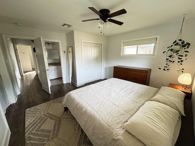 3609 Green Acres Rd, Metairie, LA 70003 - bedroom featuring a closet, dark wood finished floors, ceiling fan, and baseboards