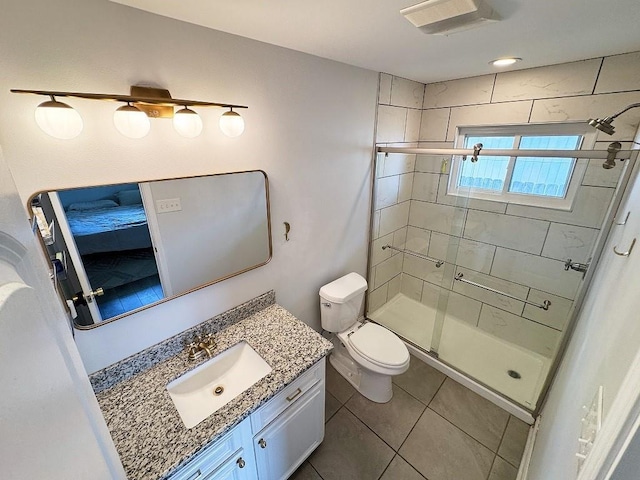 3609 Green Acres Rd, Metairie, LA 70003 - full bath with a shower stall, vanity, toilet, and tile patterned flooring