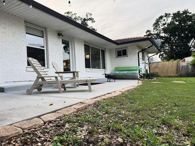 3609 Green Acres Rd, Metairie, LA 70003 - rear view of house with brick siding and a patio area