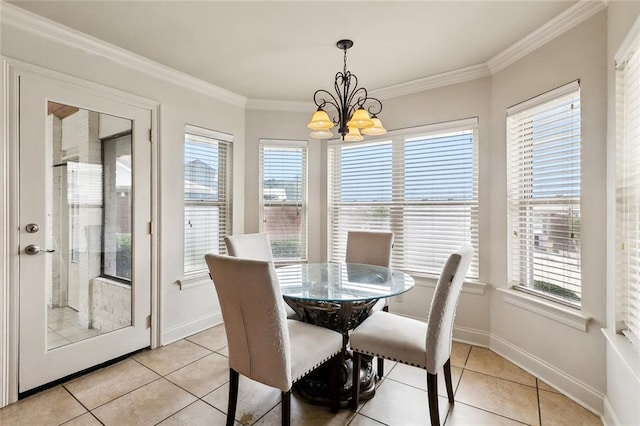 101 Gretel Cv, Slidell, LA 70458 - dining space with light tile patterned floors, a chandelier, crown molding, and baseboards