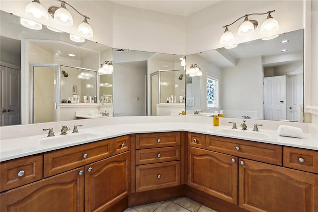 101 Gretel Cv, Slidell, LA 70458 - bathroom with a shower stall, tile patterned floors, and double vanity