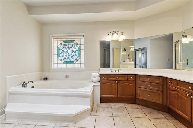101 Gretel Cv, Slidell, LA 70458 - full bathroom with a garden tub, vanity, a shower stall, and tile patterned floors