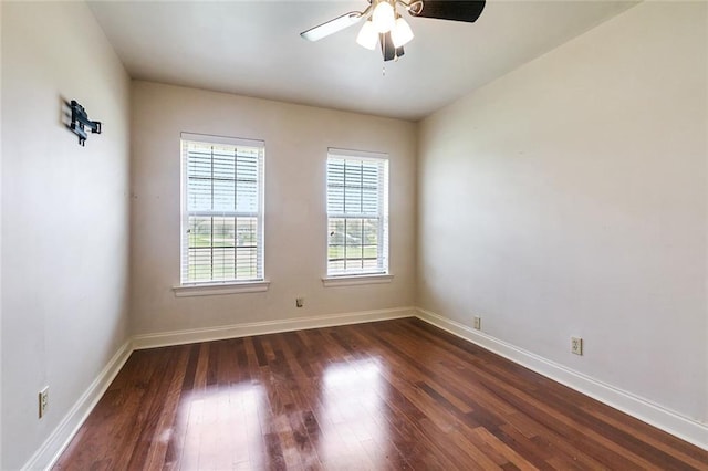101 Gretel Cv, Slidell, LA 70458 - empty room with dark wood-style floors, baseboards, and a ceiling fan