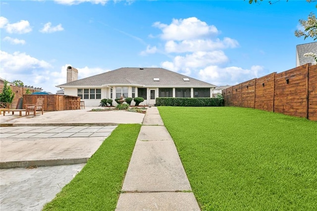101 Gretel Cv, Slidell, LA 70458 - rear view of house featuring a patio area and a chimney