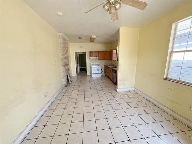 233436 N Miro St, New Orleans, LA 70117 - kitchen with white range with electric cooktop, a ceiling fan, dishwasher, light tile patterned floors, and baseboards