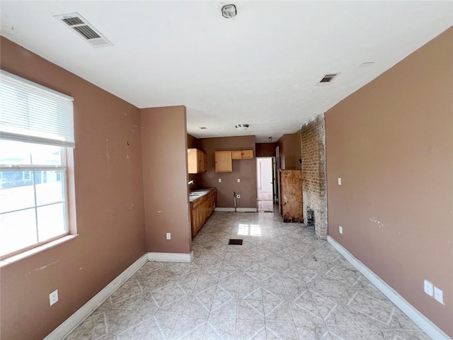 233436 N Miro St, New Orleans, LA 70117 - unfurnished living room featuring baseboards