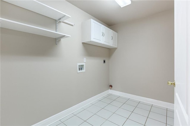 3133 Terrace Ave, Slidell, LA 70458 - laundry room featuring hookup for a washing machine, cabinet space, light tile patterned floors, and electric dryer hookup