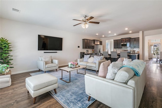 521 Lakeshore Village Ln, Slidell, LA 70461 - living room featuring a ceiling fan, dark wood finished floors, recessed lighting, and baseboards