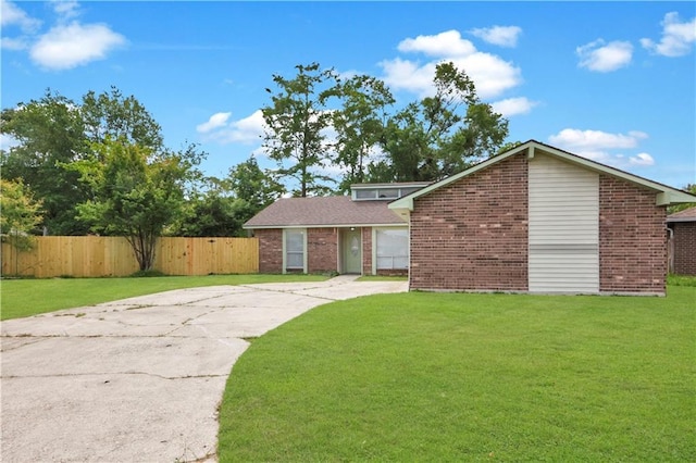 300 Somerset Dr, Slidell, LA 70461 - mid-century inspired home featuring concrete driveway and brick siding