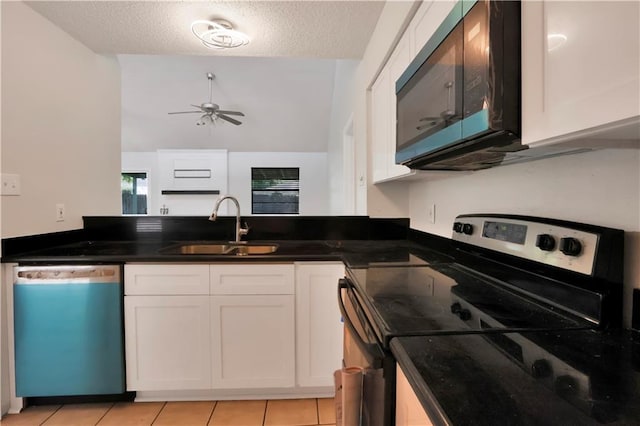 300 Somerset Dr, Slidell, LA 70461 - kitchen featuring dishwashing machine, stainless steel range with electric stovetop, a sink, white cabinets, and ceiling fan