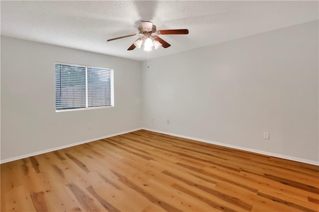 300 Somerset Dr, Slidell, LA 70461 - empty room with wood finished floors, a ceiling fan, and baseboards