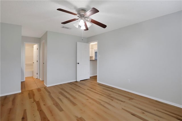 300 Somerset Dr, Slidell, LA 70461 - unfurnished bedroom with light wood finished floors, baseboards, ceiling fan, and a closet