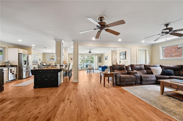 3425 Vincennes Pl, New Orleans, LA 70125 - living room featuring ceiling fan, crown molding, light wood-type flooring, and recessed lighting
