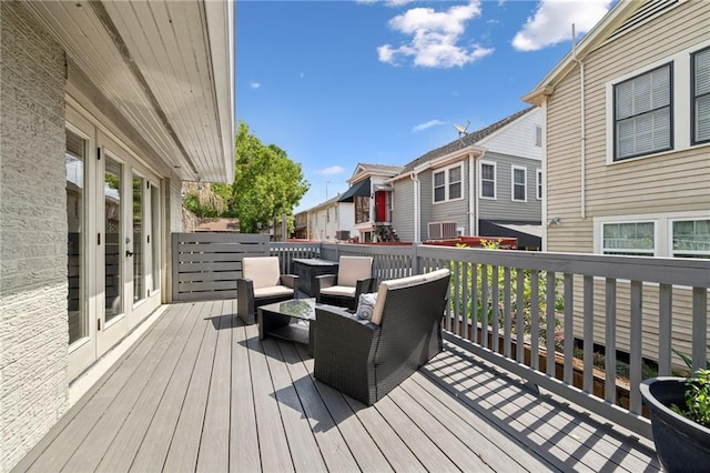 3425 Vincennes Pl, New Orleans, LA 70125 - wooden deck featuring a residential view, central air condition unit, and an outdoor living space