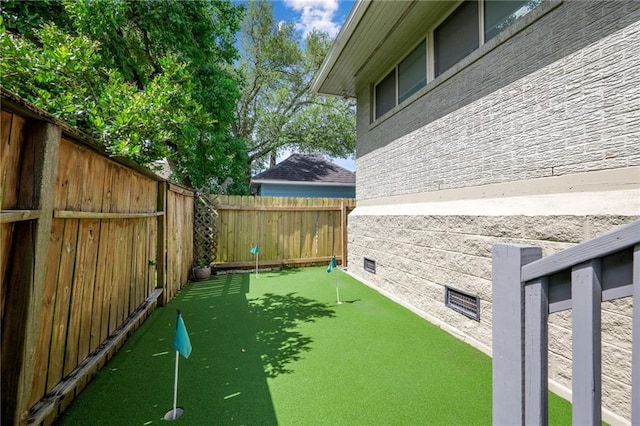 3425 Vincennes Pl, New Orleans, LA 70125 - view of yard with a putting green