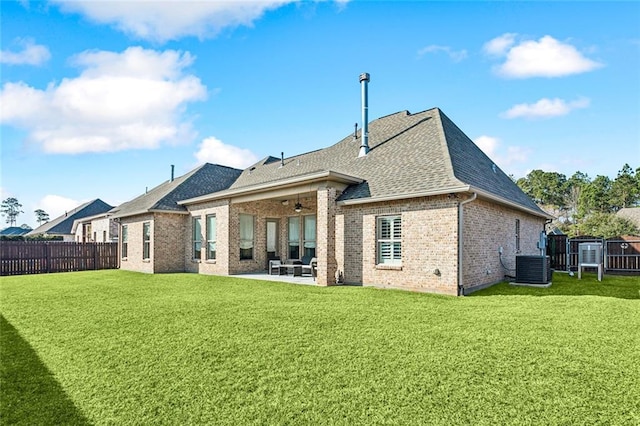 801 Rue Bourdeaux, Covington, LA 70433 - rear view of house with brick siding, roof with shingles, a patio area, central AC unit, and ceiling fan