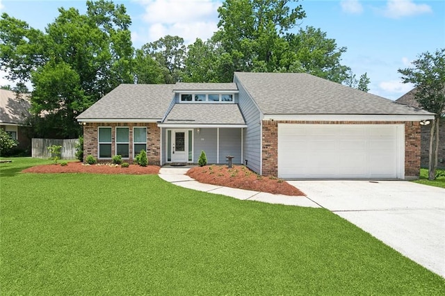 39 Piper Ln, Mandeville, LA 70448 - mid-century modern home with concrete driveway, a garage, brick siding, and a shingled roof