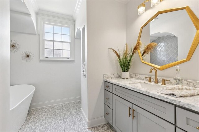 6951 Memphis St, New Orleans, LA 70124 - full bath with baseboards, vanity, ornamental molding, and a freestanding bath