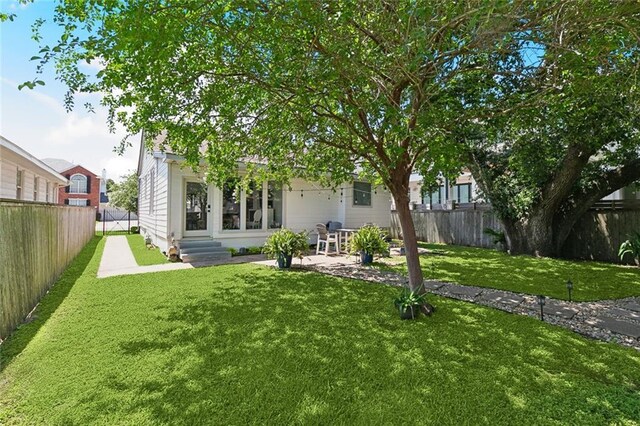 6951 Memphis St, New Orleans, LA 70124 - rear view of house with entry steps and a patio