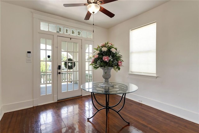 2409-11 St Ann St, New Orleans, LA 70119 - doorway with plenty of natural light, baseboards, a ceiling fan, and hardwood / wood-style flooring