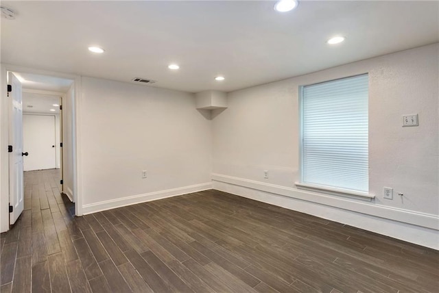 2409-11 St Ann St, New Orleans, LA 70119 - below grade area with dark wood-style floors, baseboards, and recessed lighting