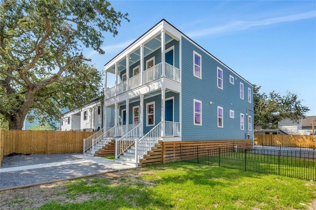 330103 S Saratoga St, New Orleans, LA 70115 - view of front of house with a balcony