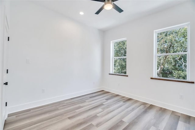 330103 S Saratoga St, New Orleans, LA 70115 - empty room featuring light wood-style floors, baseboards, ceiling fan, and recessed lighting